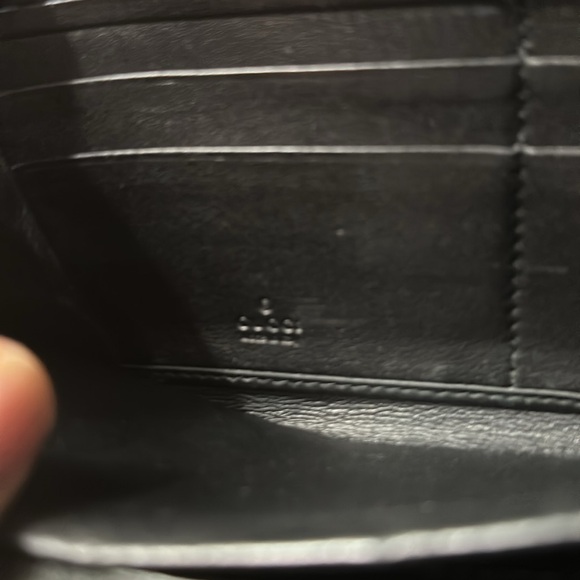 Gucci black wallet.  Gently used.  In GREAT condition.  Zippers work.  Black! - Picture 7 of 7